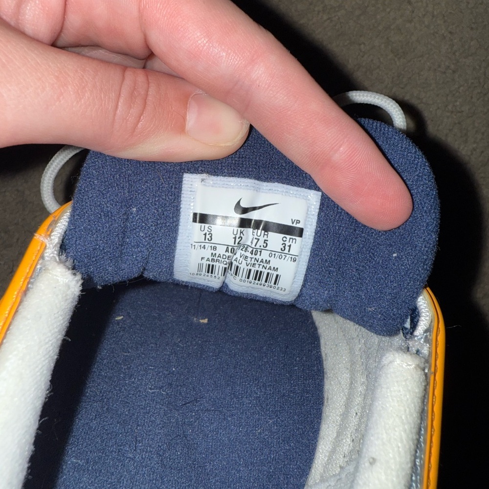 Nike Sneakers with Blue and Orange Accents - Picture 3 of 3